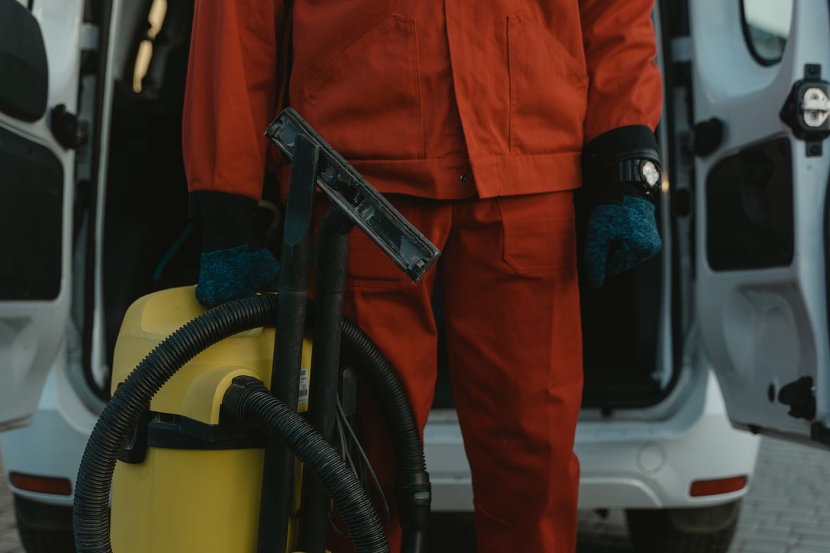 Water damage restoration technician with equipment